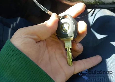 1999 BMW 323Ic z USA, uszkodzony, nr VIN WBABJ7334XEA17837